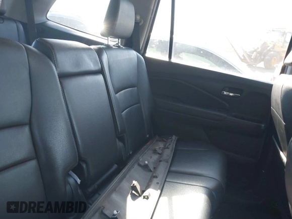 2016 Honda Pilot EX-L with VIN 5FNYF5H59GB005482, listed as a IAAI auction lot 41304248 with 127,092 mi miles and . Bid and sale history available at DreamBid. Image 8.