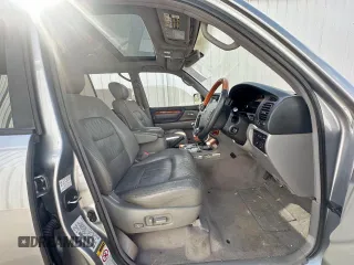 2003 Lexus LX 470 z VIN JTJHT00W933535214, wystawiony jako Copart lot #62037495 z przebiegiem 373 210 mil mil oraz Czysty tytuł • Clean title. Historia ofert i sprzedaży dostępna na DreamBid. Obrazek 5.