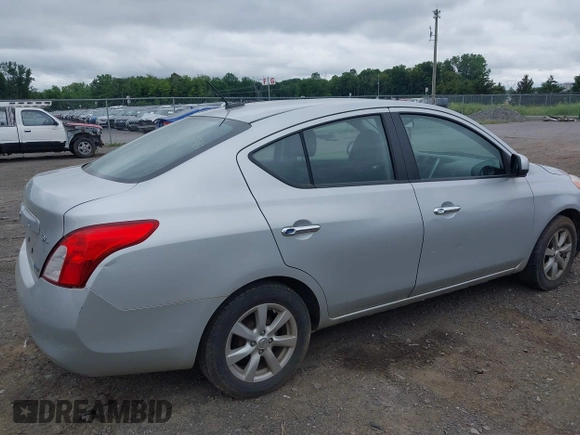 2012 Nissan Versa SV with VIN 3N1CN7AP6CL823626, listed as a IAAI auction lot 42662967 with 150,849 mi miles and . Bid and sale history available at DreamBid. Image 6.