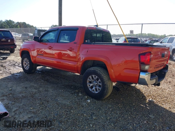 2018 Toyota Tacoma SR5 with VIN 5TFAZ5CN2JX069067, listed as a IAAI auction lot 41975459 with 92,434 mi miles and . Bid and sale history available at DreamBid. Image 3.