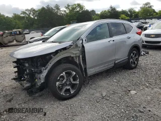 2018 Honda CR-V Touring with VIN 7FARW1H91JE039525, listed as a Copart auction lot 60513785 with 42,064 mi miles and Salvage title. Bid and sale history available at DreamBid. Image 1.