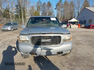 2000 GMC Denali with VIN 1GKEK13R7YR159609, listed as a IAAI auction lot 41828674 with 231,627 mi miles. Bid and sale history available at carsss.com. Image 13.