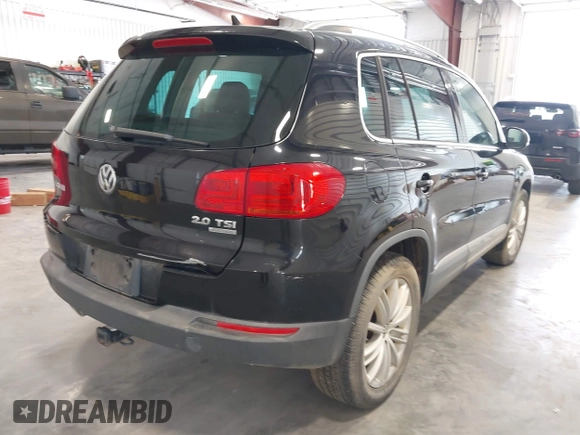 2012 Volkswagen Tiguan SE with VIN WVGBV7AX2CW503301, listed as a IAAI auction lot 42679407 with 90,603 mi miles and . Bid and sale history available at DreamBid. Image 4.