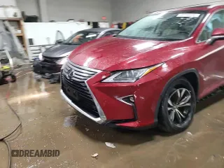 2017 Lexus RX 350 z VIN 2T2BZMCA4HC084282, wystawiony jako Copart lot #49782835 z przebiegiem 70 641 mil mil oraz Szkoda całkowita • Salvage title. Historia ofert i sprzedaży dostępna na DreamBid. Obrazek 13.