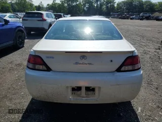 2000 Toyota Solara SE z VIN 2T1CF28P2YC378976, wystawiony jako Copart lot #61400195 z przebiegiem 197 090 mil mil oraz Czysty tytuł • Clean title. Historia ofert i sprzedaży dostępna na DreamBid. Obrazek 6.