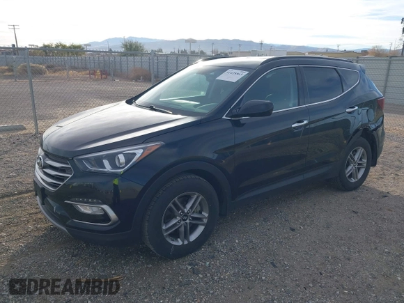 2017 Hyundai Santa Fe 2.4L z VIN 5XYZU3LB5HG425830, wystawiony jako IAAI lot #41428863 z przebiegiem 76 366 mil mil oraz . Historia ofert i sprzedaży dostępna na DreamBid. Obrazek 17.