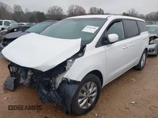 2020 Kia Sedona L with VIN KNDMA5C17L6595852, listed as a IAAI auction lot 41566584 with 102,712 mi miles. Bid and sale history available at carsss.com. Image 2.