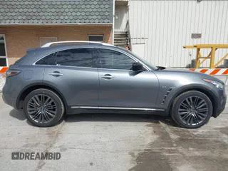 2017 Infiniti QX70 z VIN JN8CS1MW9HM412647, wystawiony jako IAAI lot #41830232 z przebiegiem 114 954 mil mil oraz . Historia ofert i sprzedaży dostępna na DreamBid. Obrazek 14.