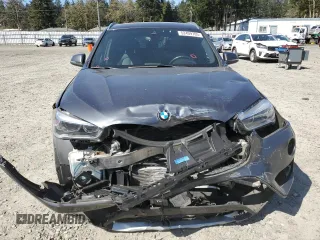 2016 BMW X1 xDrive28i with VIN WBXHT3C39GP882906, listed as a Copart auction lot 52409705 with 57,019 mi miles and Salvage Title. Bid and sale history available at carsss.com. Image 5.
