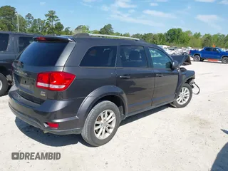 2017 Dodge Journey SXT with VIN 3C4PDCBG4HT589891, listed as a IAAI auction lot 42017420 with 135,740 mi miles and . Bid and sale history available at carsss.com. Image 4.