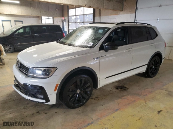 2021 Volkswagen Tiguan SE with VIN 3VV3B7AX7MM100628, listed as a Copart auction lot 47676665 with 48,668 mi miles and Salvage Title. Bid and sale history available at carsss.com. Image 1.