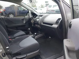 2007 Honda Fit with VIN JHMGD37467S065669, listed as a IAAI auction lot 42078795 with 124,030 mi miles. Bid and sale history available at carsss.com. Image 5.