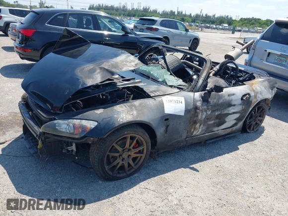 2005 Honda S2000 z VIN JHMAP21405S006517, wystawiony jako IAAI lot #42071234 z przebiegiem Nie podano mil oraz . Historia ofert i sprzedaży dostępna na DreamBid. Obrazek 13.