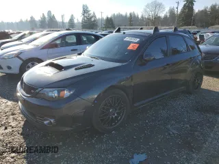 2009 Subaru WRX STI with VIN JF1GR896X9L802972, listed as a Copart auction lot 87186164 with 160,838 mi miles and Salvage title. Bid and sale history available at DreamBid. Image 1.