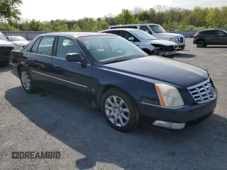 2008 Cadillac DTS 1SC with VIN 1G6KD57Y78U205845, listed as a Copart auction lot 54851995 with 189,718 mi miles and Salvage Title. Bid and sale history available at DreamBid. Image 4.