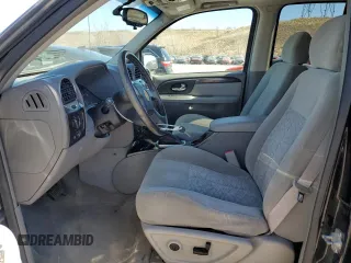2005 GMC Envoy SLE z VIN 1GKDT13S752390266, wystawiony jako Copart lot #50766935 z przebiegiem 115 225 mil mil oraz Szkoda całkowita • Salvage title. Historia ofert i sprzedaży dostępna na DreamBid. Obrazek 7.