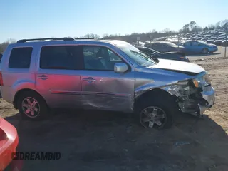 2009 Honda Pilot Touring with VIN 5FNYF48979B008851, listed as a IAAI auction lot 41252736 with 183,292 mi miles and . Bid and sale history available at carsss.com. Image 13.