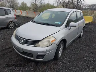 2008 Nissan Versa 1.8 S with VIN 3N1BC13EX8L369608, listed as a IAAI auction lot 42046943 with 133,826 mi miles. Bid and sale history available at carsss.com. Image 2.