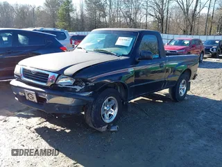1998 Mazda B-Series 2WD Truck SX with VIN 4F4YR12C4WTM47743, listed as a IAAI auction lot 41430832 with 318,909 mi miles. Bid and sale history available at carsss.com. Image 2.