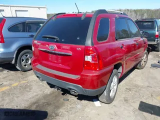 2009 Kia Sportage LX with VIN KNDJF724597562850, listed as a IAAI auction lot 41601084 with 236,281 mi miles. Bid and sale history available at carsss.com. Image 4.