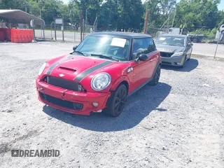 2013 MINI Hardtop S with VIN WMWSV3C50DT476088, listed as a IAAI auction lot 42534717 with 130,565 mi miles and . Bid and sale history available at DreamBid. Image 2.