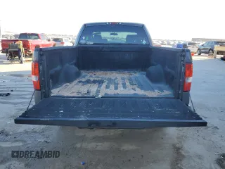 2007 Ford F-150 STX with VIN 1FTRX12W97KD12990, listed as a Copart auction lot 46939335 with 216,759 mi miles and Salvage Title. Bid and sale history available at DreamBid. Image 6.