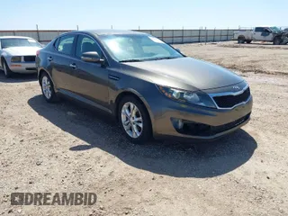 2013 Kia Optima LX with VIN 5XXGM4A74DG093454, listed as a IAAI auction lot 42004990 with 176,667 mi miles. Bid and sale history available at carsss.com. Image 1.