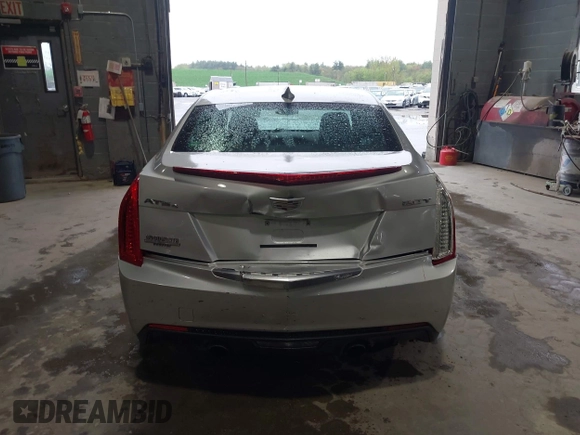 2016 Cadillac ATS Standard AWD z VIN 1G6AG5RX6G0149829, wystawiony jako IAAI lot #42165534 z przebiegiem 40 996 mil mil oraz . Historia ofert i sprzedaży dostępna na DreamBid. Obrazek 16.