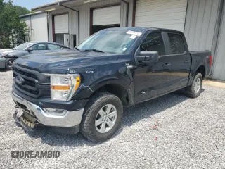2022 Ford F-150 XL with VIN 1FTFW1E51NFA04887, listed as a Copart auction lot 55734705 with 123,590 mi miles and Salvage title. Bid and sale history available at DreamBid. Image 1.