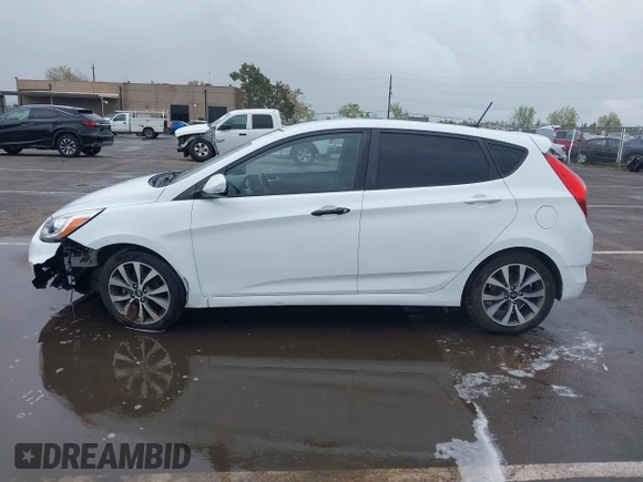 2016 Hyundai Accent Sport with VIN KMHCU5AE4GU249974, listed as a IAAI auction lot 41916351 with 127,692 mi miles. Bid and sale history available at carsss.com. Image 14.