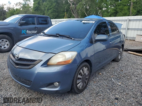 2009 Toyota Yaris z VIN JTDBT903X91297199, wystawiony jako Copart lot #57088615 z przebiegiem 161 170 mil mil oraz Szkody całkowita. Historia ofert i sprzedaży dostępna na DreamBid. Obrazek 1.