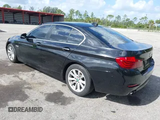 2015 BMW 5 Series 528i with VIN WBA5A5C57FD512845, listed as a IAAI auction lot 41954256 with 174,944 mi miles. Bid and sale history available at carsss.com. Image 3.