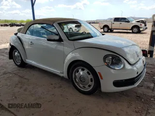 2013 Volkswagen Beetle 2.5L w/Sound/Nav z VIN 3VW5P7AT7DM811992, wystawiony jako Copart lot #59526355 z przebiegiem 102 542 mil mil oraz Szkoda całkowita • Salvage title. Historia ofert i sprzedaży dostępna na DreamBid. Obrazek 4.