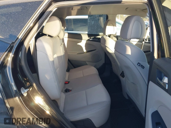 2017 Hyundai Tucson Sport with VIN KM8J3CA27HU410971, listed as a IAAI auction lot 41468401 with 115,080 mi miles and . Bid and sale history available at DreamBid. Image 8.