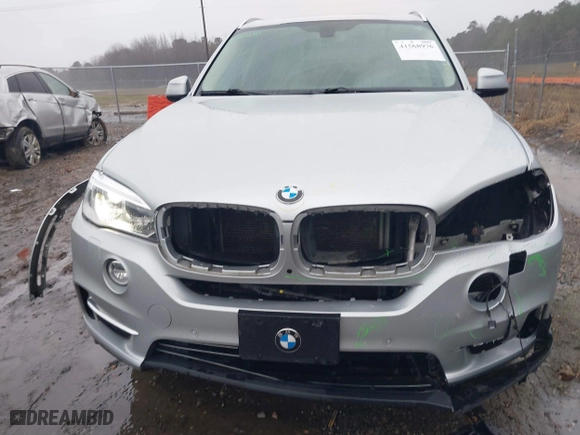 2015 BMW X5 xDrive35d with VIN 5UXKS4C51F0N06221, listed as a IAAI auction lot 41568976 with 162,442 mi miles. Bid and sale history available at carsss.com. Image 6.