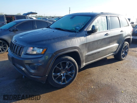 2015 Jeep Grand Cherokee Laredo with VIN 1C4RJFAGXFC631123, listed as a IAAI auction lot 41859251 with 201,558 mi miles. Bid and sale history available at carsss.com. Image 2.