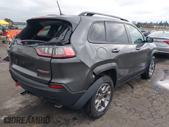2022 Jeep Cherokee Trailhawk with VIN 1C4PJMBX6ND505196, listed as a IAAI auction lot 41536316 with 9,976 mi miles. Bid and sale history available at carsss.com. Image 4.