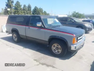 1988 Dodge Dakota с VIN 1B7GN14X0JS704704, выставлен на аукционе IAAI как лот 42213218 с пробегом 164 291 миль миль и . История ставок и продаж доступна на DreamBid. Изображение 1.