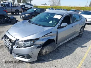 2016 Honda Civic Sedan EX with VIN 2HGFC2F74GH563268, listed as a IAAI auction lot 41805038 with 125,577 mi miles. Bid and sale history available at carsss.com. Image 18.