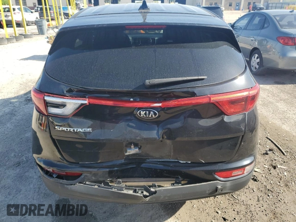 2017 Kia Sportage LX z VIN KNDPMCAC4H7103647, wystawiony jako Copart lot #56745355 z przebiegiem 105 461 mil mil oraz Szkoda całkowita • Salvage title. Historia ofert i sprzedaży dostępna na DreamBid. Obrazek 6.