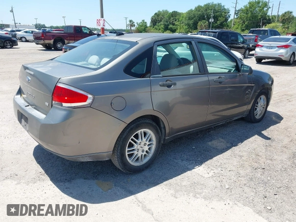 2011 Ford Focus SE with VIN 1FAHP3FN4BW174842, listed as a IAAI auction lot 42027681 with 58,616 mi miles. Bid and sale history available at carsss.com. Image 4.