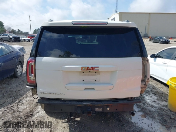 2016 GMC Yukon XL SLE with VIN 1GKS1FKC0GR331459, listed as a IAAI auction lot 41557718 with 203,803 mi miles. Bid and sale history available at carsss.com. Image 16.