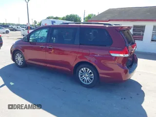 2012 Toyota Sienna XLE AAS with VIN 5TDYK3DC8CS258612, listed as a IAAI auction lot 41899311 with 75,779 mi miles and . Bid and sale history available at DreamBid. Image 3.