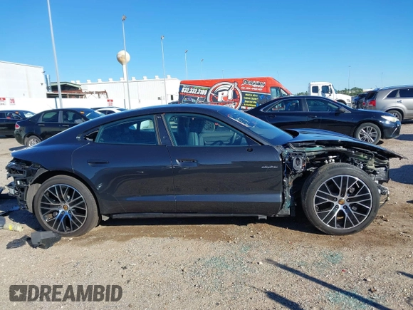 2022 Porsche Taycan with VIN WP0AA2Y11NSA11615, listed as a IAAI auction lot 41253804 with 34,182 mi miles and . Bid and sale history available at DreamBid. Image 14.