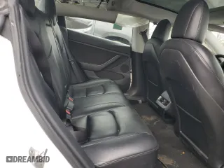 2021 Tesla Model 3 Standard Range Plus with VIN 5YJ3E1EA5MF028051, listed as a Copart auction lot 48085105 with 49,531 mi miles and Clean Title. Bid and sale history available at carsss.com. Image 10.