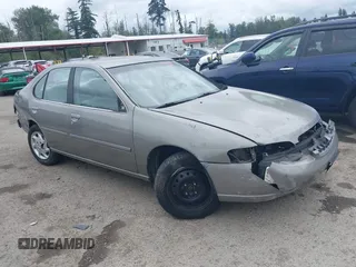 1999 Nissan Altima XE z VIN 1N4DL01D2XC230535, wystawiony jako IAAI lot #39990401 z przebiegiem 192 745 mil mil oraz . Historia ofert i sprzedaży dostępna na DreamBid. Obrazek 1.