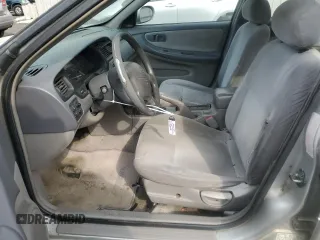 1999 Nissan Altima XE z VIN 1N4DL01D1XC202466, wystawiony jako Copart lot #54548015 z przebiegiem 131 409 mil mil oraz Szkoda całkowita • Salvage title. Historia ofert i sprzedaży dostępna na DreamBid. Obrazek 7.