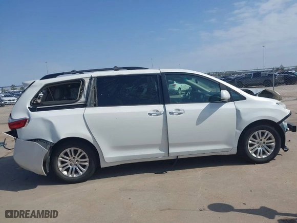 2015 Toyota Sienna XLE with VIN 5TDYK3DC0FS537542, listed as a IAAI auction lot 41578232 with 125,007 mi miles. Bid and sale history available at carsss.com. Image 14.