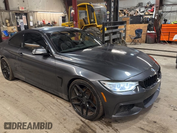 2014 BMW 4 Series 428i xDrive with VIN WBA3N5C56EF716258, listed as a Copart auction lot 52916185 with 106,512 mi miles and Salvage Title. Bid and sale history available at DreamBid. Image 1.