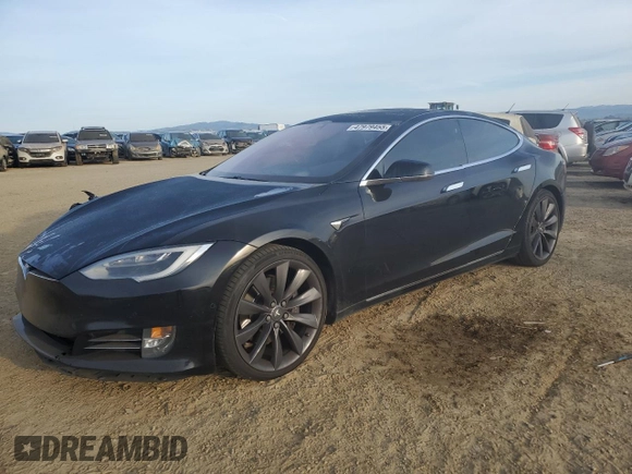 2017 Tesla Model S 100D with VIN 5YJSA1E27HF185487, listed as a Copart auction lot 47979455 with 184,987 mi miles and Salvage Title. Bid and sale history available at DreamBid. Image 1.